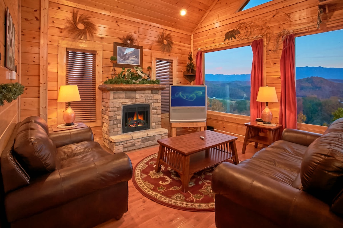 Welkom in je gezellige woonkamer, het Hart van de hut! Stap in een warme en uitnodigende leefruimte waar rustieke charme en modern comfort samenkomen. 