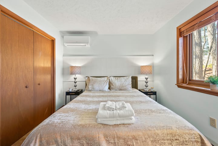 Bedroom 2 features a queen bed.