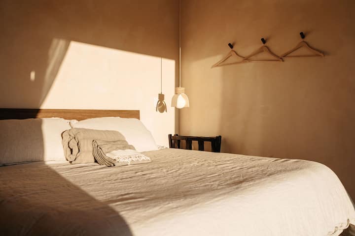 Primary bedroom at Sand.