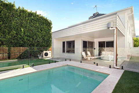 Sunbrite Breeze—Poolside Relaxation by the Sea