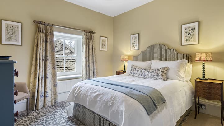 The Delphinium bedroom has a king-size bed.