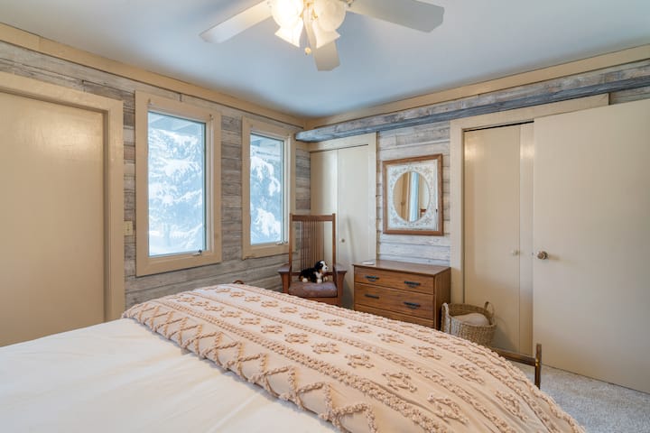 Bedroom 2 features a queen bed and a private entrance.
