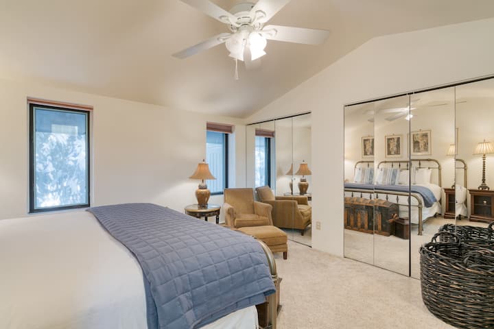 Primary bedroom features a king bed and ensuite bathroom.