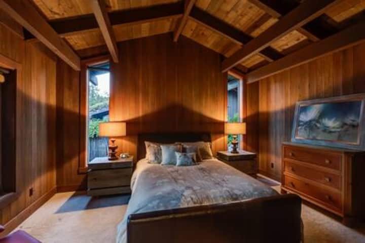 Guest Bedroom has a queen bed and adjacent full bath