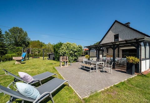 LandLust vacation home with hot tub and barrel sauna