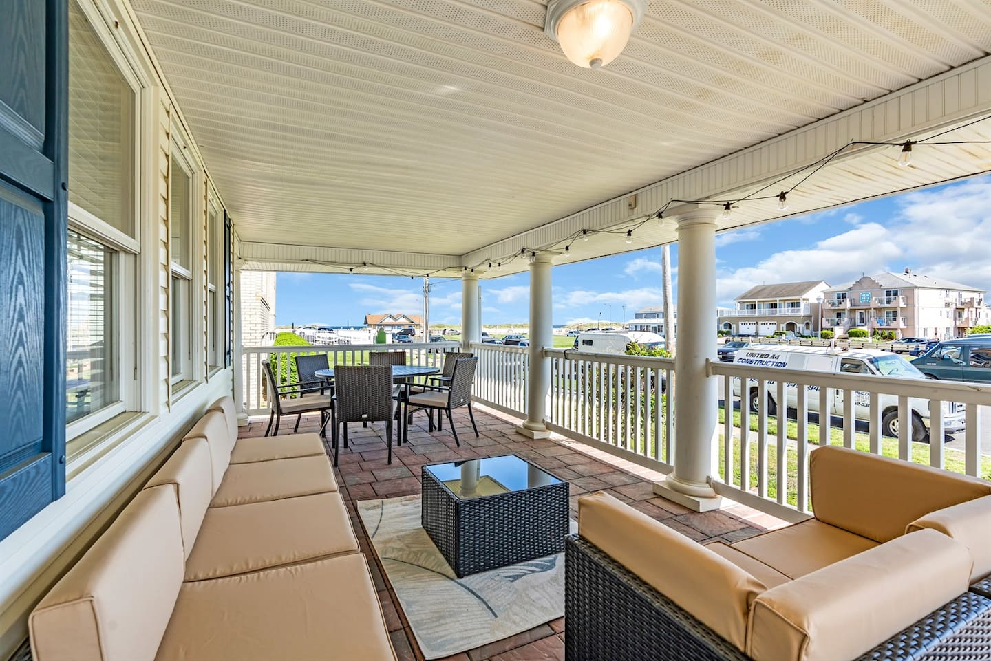 Expert said:  Soak up ocean breezes from this spacious wraparound porch, complete with plush seating and a dining area ideal for morning coffee or sunset cocktails.
