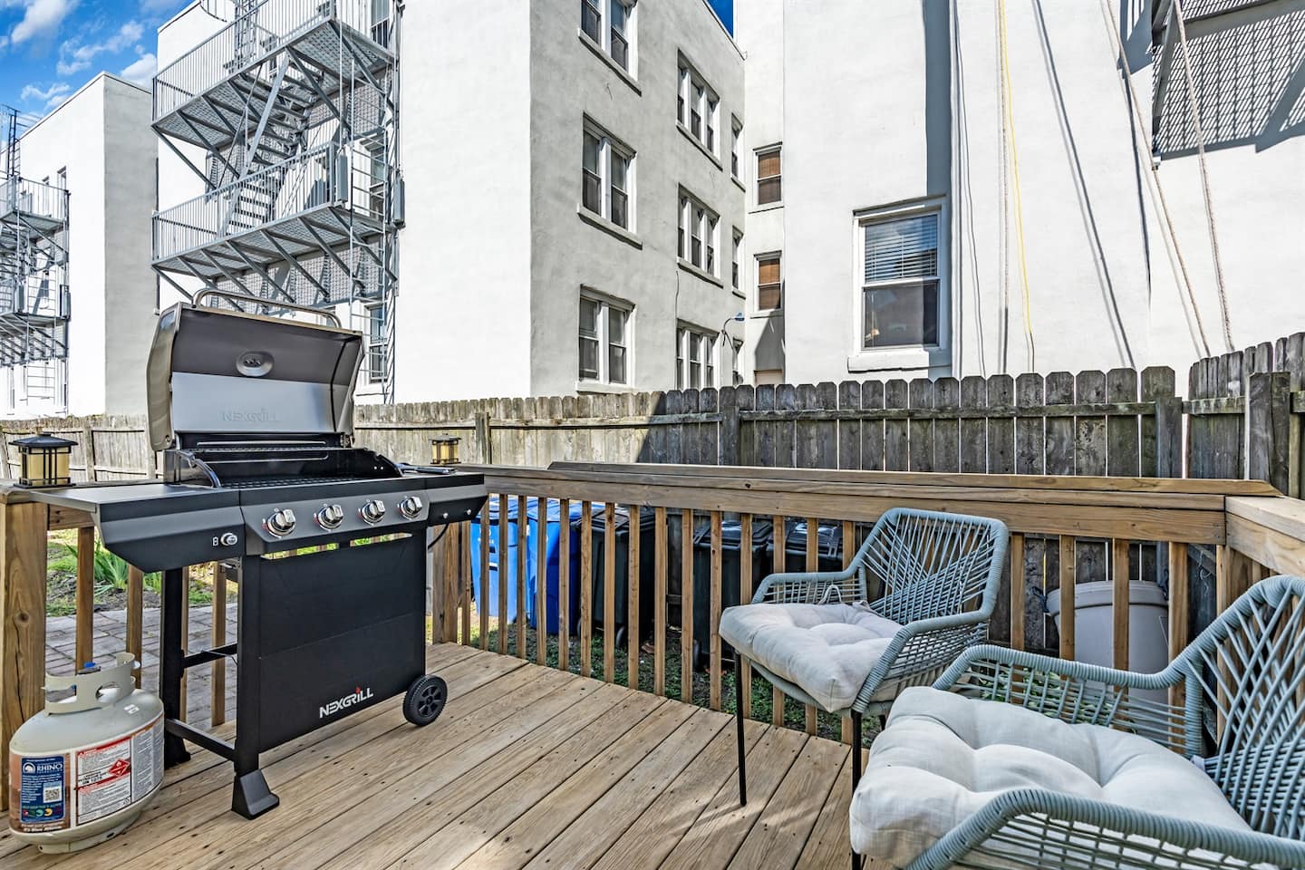 Outdoor propane grill with chef and assistant seating while you grill for the crew!