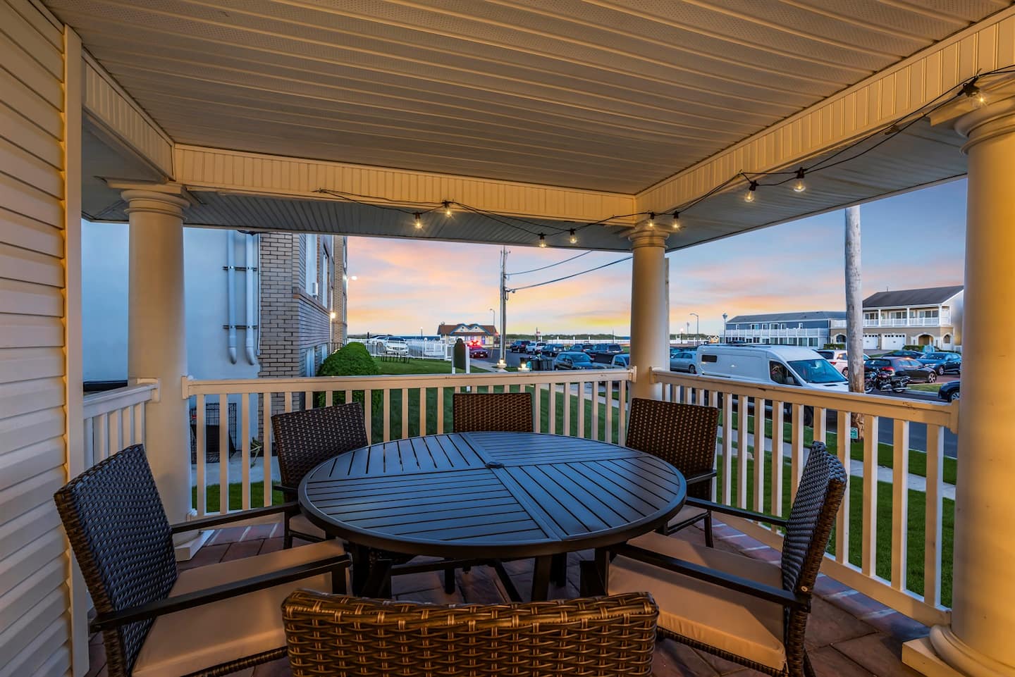 The wraparound porch furnished for lounging, third angle