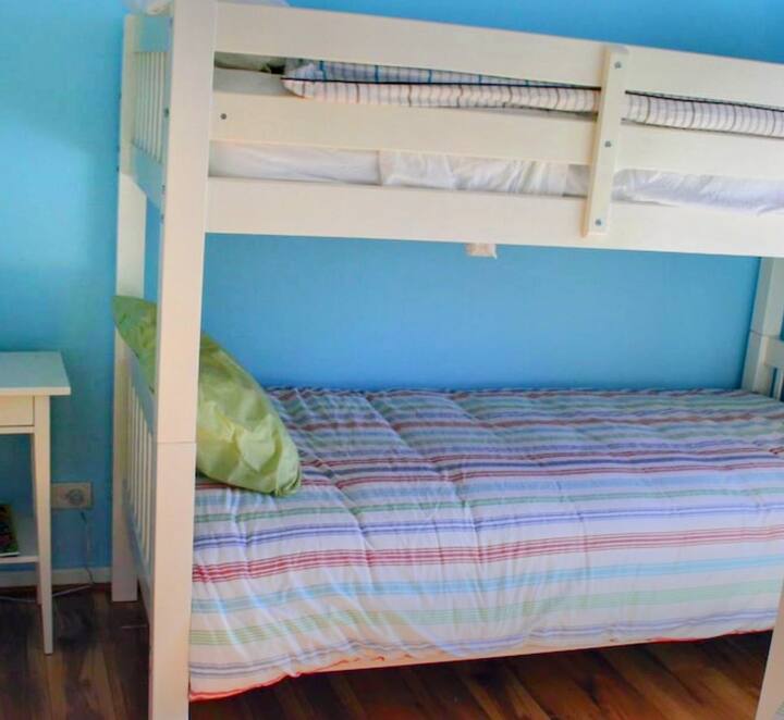 Upstairs 2nd Bedroom : 4 Single Beds - sleeps 4 (All single beds are part of a bunk bed configuration.)