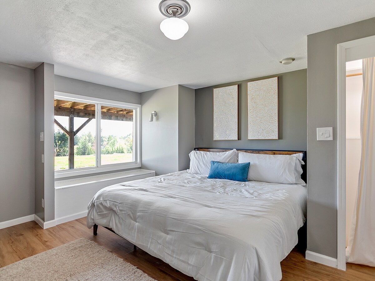 Bedroom 5 with king bed, cozy lighting, and ample space