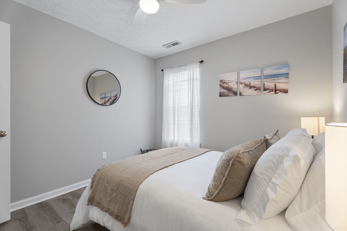 Lit double dans la chambre avec lit gigogne