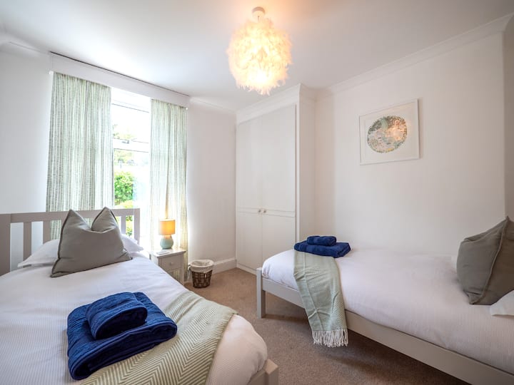 Twin room with plenty of natural lighting.
