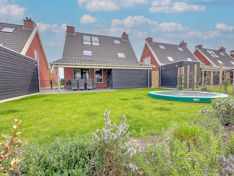 Top performing Airbnb: Modern villa with a sauna, hot tub, and a garden in Wijk 01 Colijnsplaat