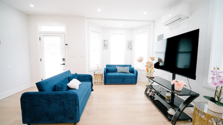 Sala de estar con dos sofás cama