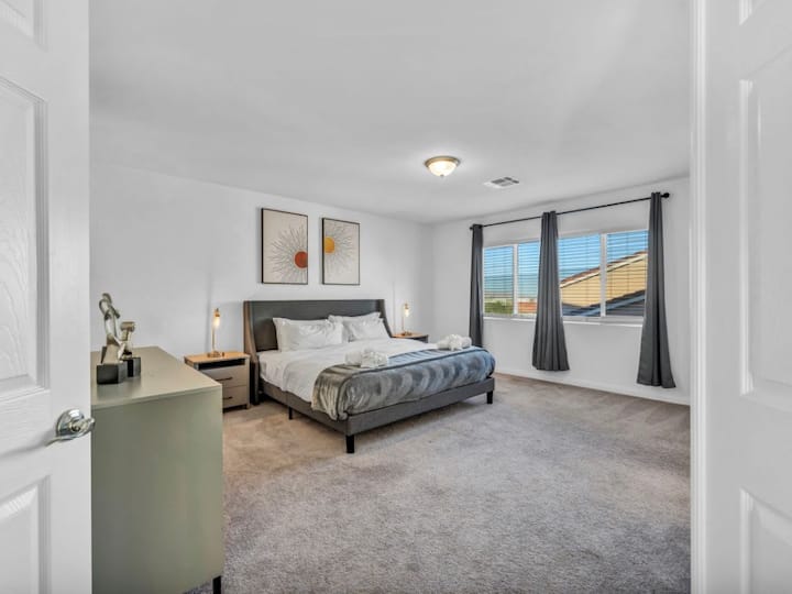 Master's bedroom on the 3rd level with a queen bed.