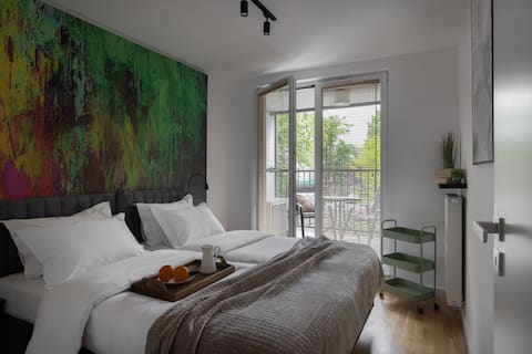Modern apartment near river w/ balcony