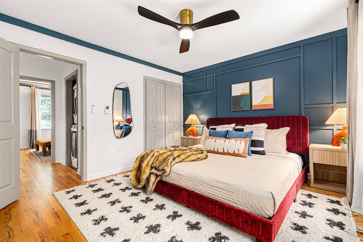 Another tranquil escape featuring a king bed, 65" Smart TV, closet, and full-size mirror—designed for comfort and relaxation.