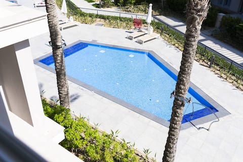 Relaxing Pool View Getaway in Heart of Marassi