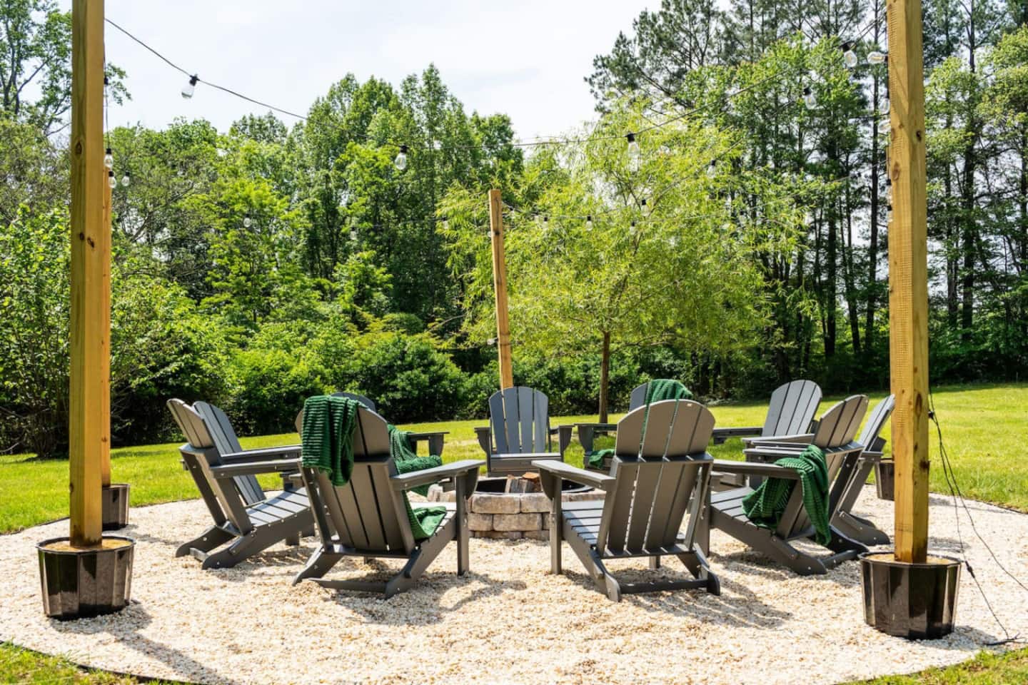 Adirondack chairs around the fire pit area
