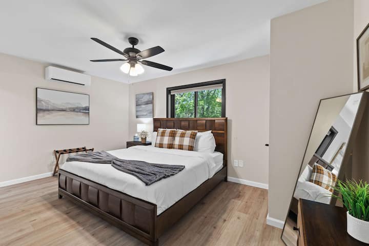 Obsessed with the details  Bedroom 5 with King bed, TV, 2 closets, split system, ceiling fan—wooden accents and soft lighting make it cozy and inviting! #BedroomStyle #InteriorDesign #HomeInspo #Bedroom5