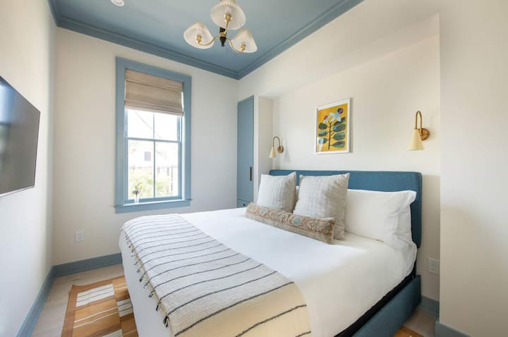 A calming retreat wrapped in soft textures, plush linens, and an elevated, neutral palette.
