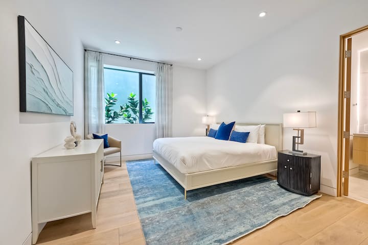 Una suite tranquila con una paleta de colores frescos