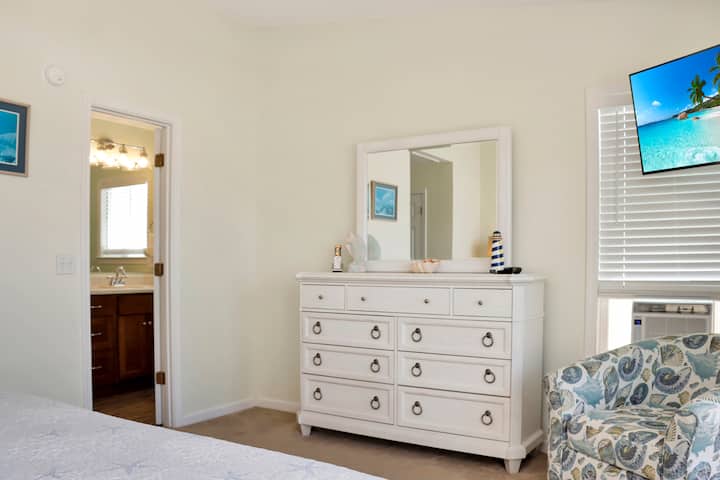 Bedroom 2 with TV and Master Bathroom