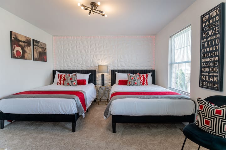 The fourth bedroom features two full beds – great for kids, friends, or extended family.
