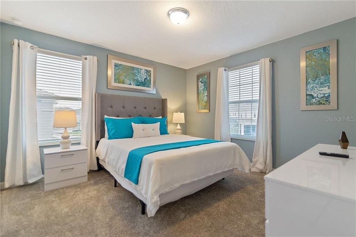 Slaapkamer met queensize bed