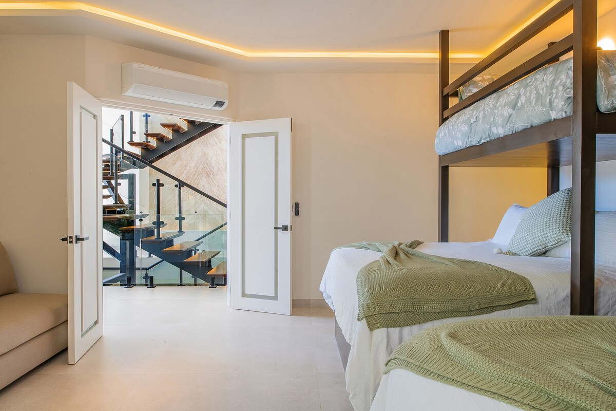 Sovrumssvit med mezzaninsängar