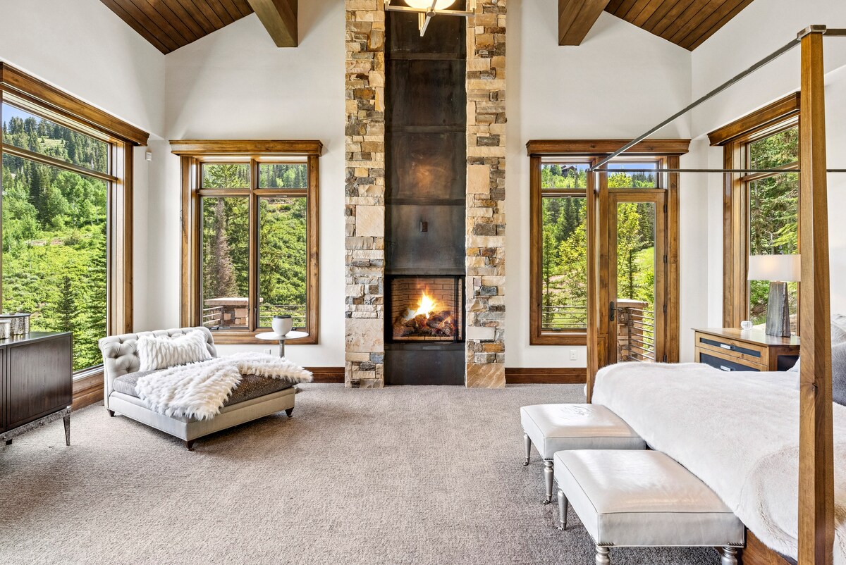 large primary suite with designer furnishing