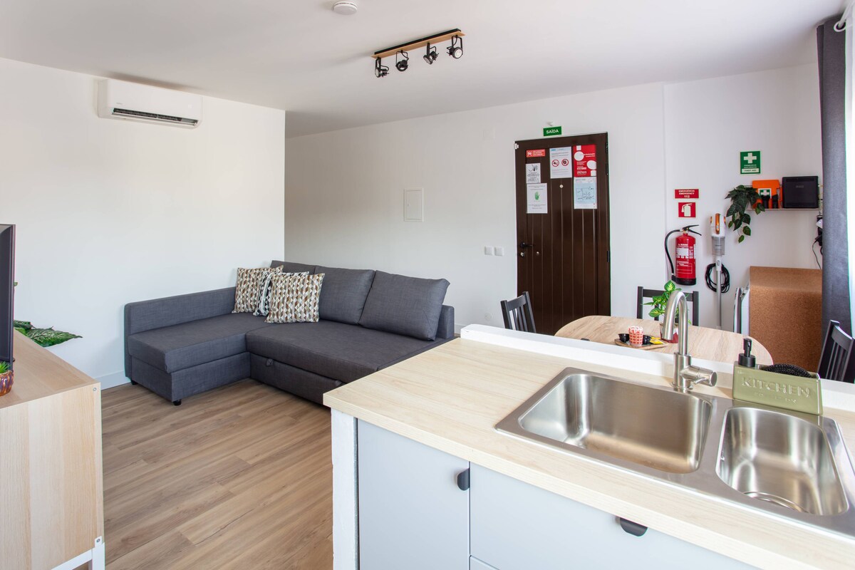 Modern condo with AC and private balcony 4