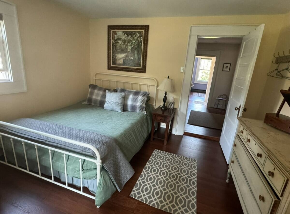 Dormitorio 3 1 cama queen, 2 camas individuales