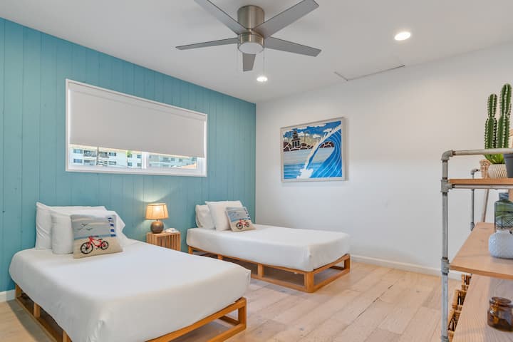 Bedroom 2 features two twin beds.
