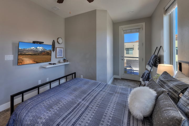 Step through the glass door to a private upstairs patio—perfect for morning coffee, fresh air, and watching the sunrise.