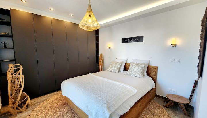 The Celeste Case - Bedroom 1 - Bed and Storage Cabinet View