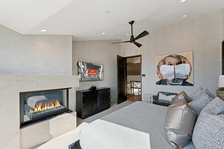 modern fireplace and tv in guest suite