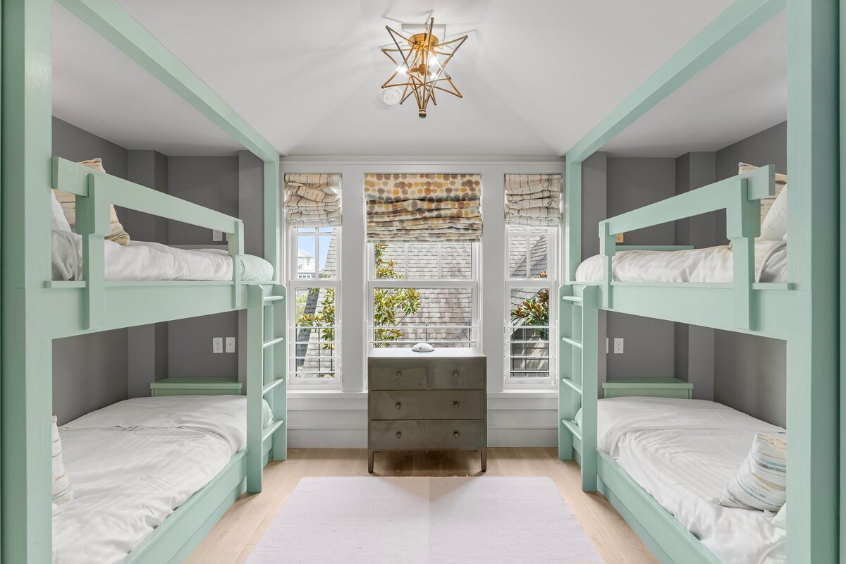 Bedroom #5 features (2) Twin-over-Twin bunks, with ensuite and smart tv.