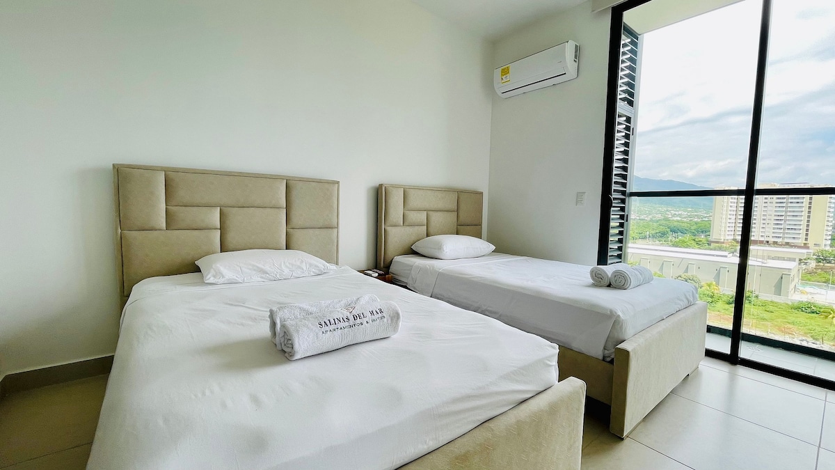 Habitación con cómodas camas, Tv y aire acondicionado