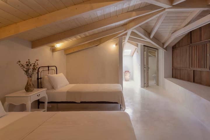 The mezzanine floor above the open-plan communal area. (Bedroom 5)