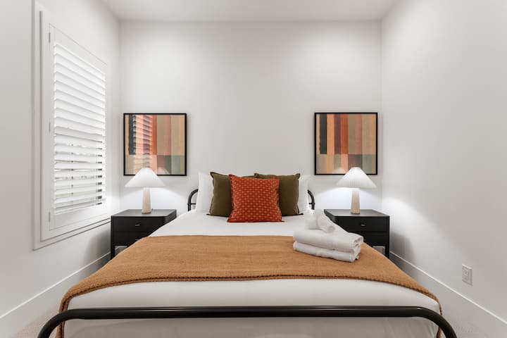 3rd Bedroom featuring a Queen bed and walk-in closet.