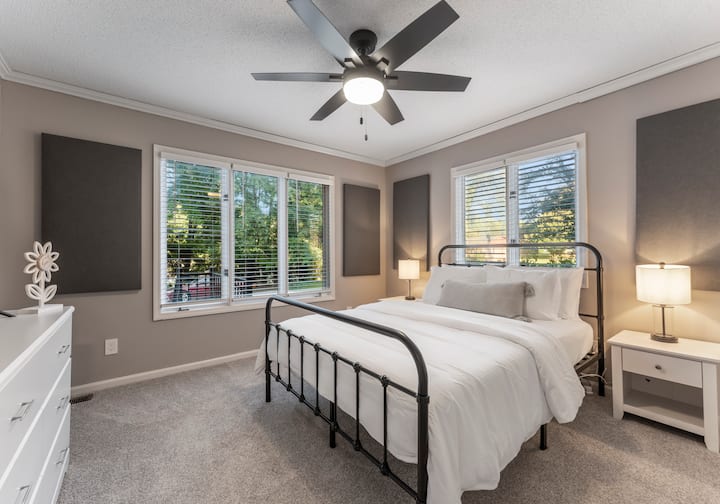 Bedroom 1, located on the lower level, features a queen bed.