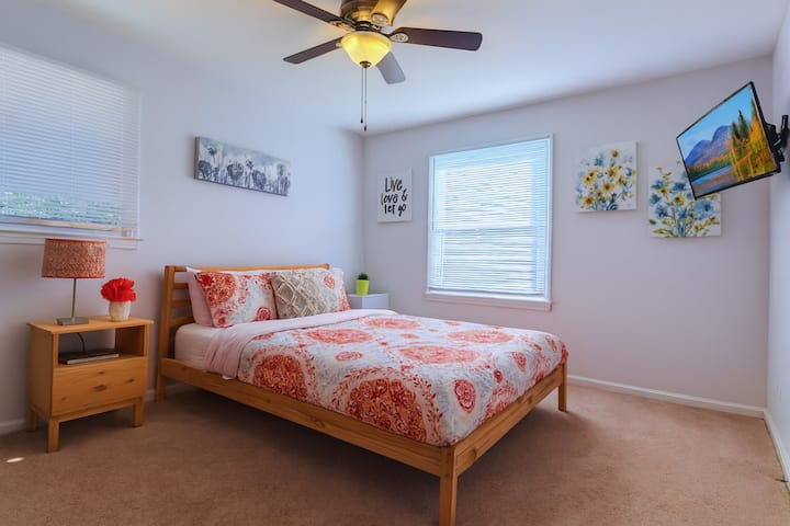 Colorful Main Level Guest Room with Queen Bed.