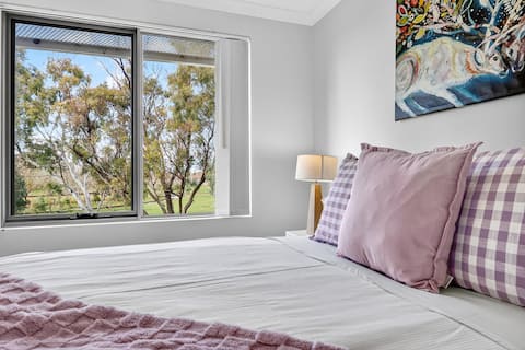 Chic 2BR Rockingham Escape Garden Views