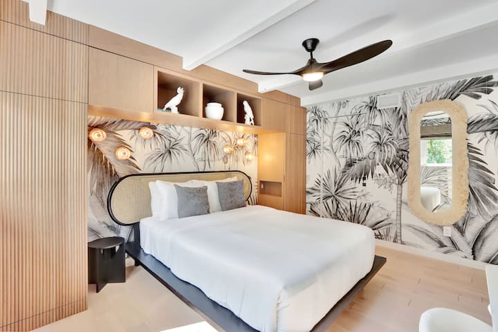 First-Floor Queen Bedroom #2 | Queen bed, desk, Smart TV, Jack-and-Jill bathroom access.