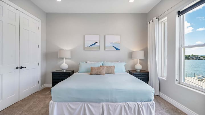 Bedroom 2: Another King-size bed and even more lake views!