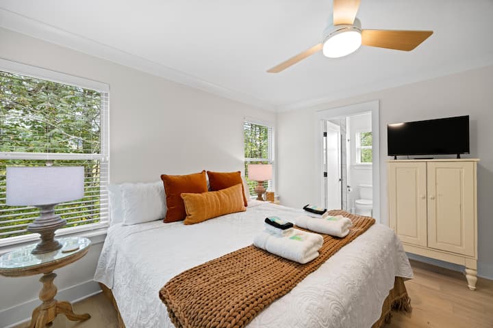 A comfortable bedroom with a TV for downtime