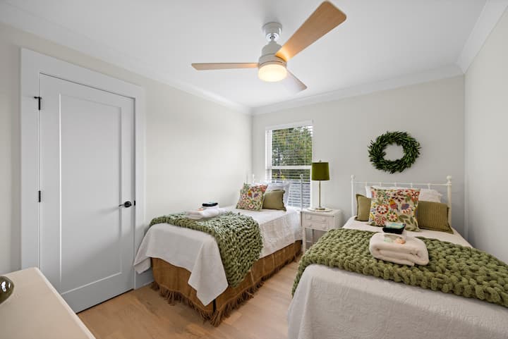 Two separate beds in a welcoming guest room