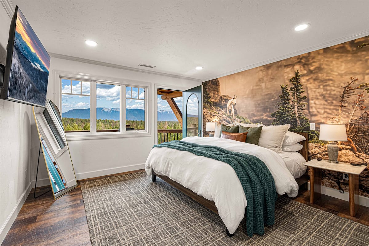 King bedroom with mountain views from the bed