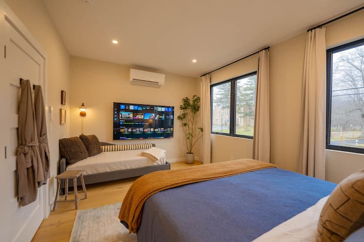 A twin daybed provides additional sleeping for those with young ones that like to stay close.